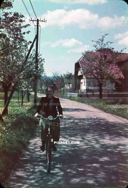 american tourist woman on bike in Freiburg, Germany 1939