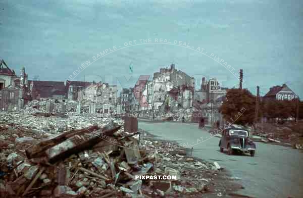 car driving through ruins in Saint Nazaire, France 1942