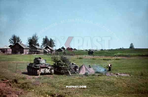 Czech Panzer Tank 38T, Number 831 beside German Panzer 2 under camouflage, 19th Panzer Division, Minsk, 1941.