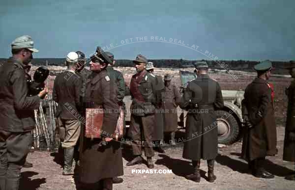 Erwin Rommel standing beside Horch 901 Staff car after Propaganda Film Interview, Tunisia. 1942. General Staff.