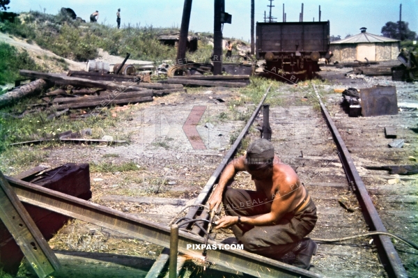 German army engineers repairing destroyed train tracks near Kharkov Ukraine 1942. 177. Division Kraftfahr Ersatz Battalion