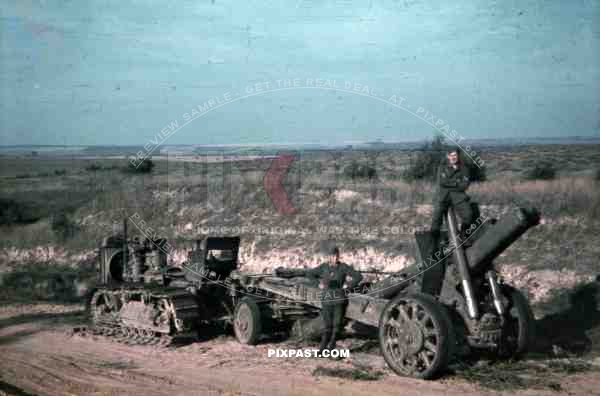German army mechanics inspect captured Russian artillery gun and tractor,  Bryansk 1942, 10th Motorised infantry division