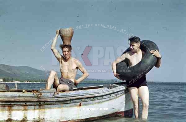 German soldiers infantry shorts swimming play joke funny pot boat beach sea Greece 1942