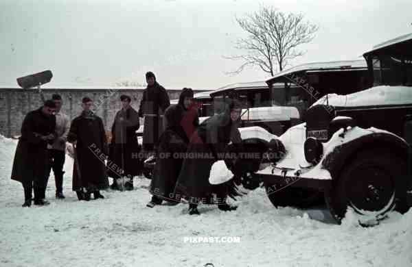 German soldiers Norway 1941 supply trucks lorries snow cleaning shovel winter jackets