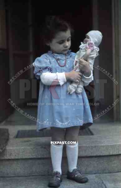 little girl with her doll in Germany 1938