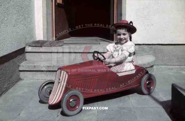 little girl with pedal car, Germany 1939