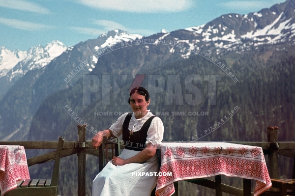 Mother in local Austrian Dirndl costume in Tyrol southern Austria 1939. Mountain restaurant.
