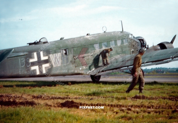 Paratroopers of the 139th Airborne Engineer Battalion inspect a captured German Ju 52 Junkers Transport plane Germany 1945