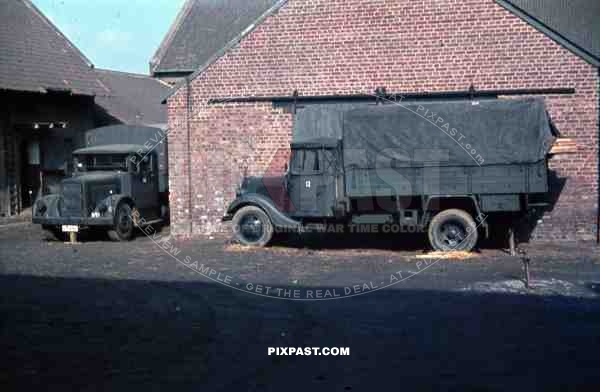 parked trucks at Wehrmacht quarter in NiederauÃŸem, Germany 1940