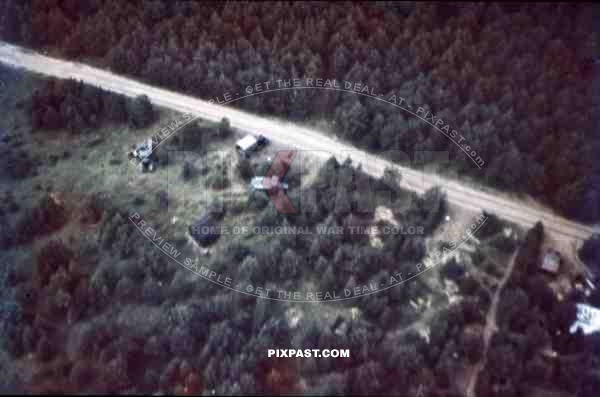 plane view from military trucks in forest