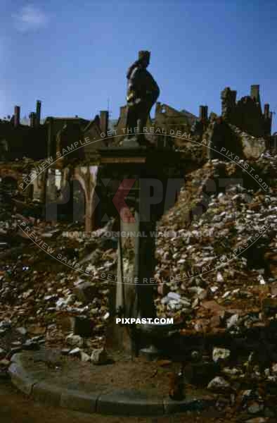 SchÃ¶ppenbrunnen among destroyed buildings in Frankfurt, Germany 1945