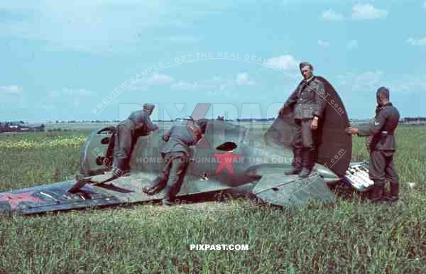 Shot down Russian fighter plane, Polikarpov monoplane, Inspected by German infantry. Summer 1941, Russia.