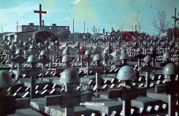 War Time Color Photo of Italian military graves graveyard with helmets and cross in Ukraine 1942