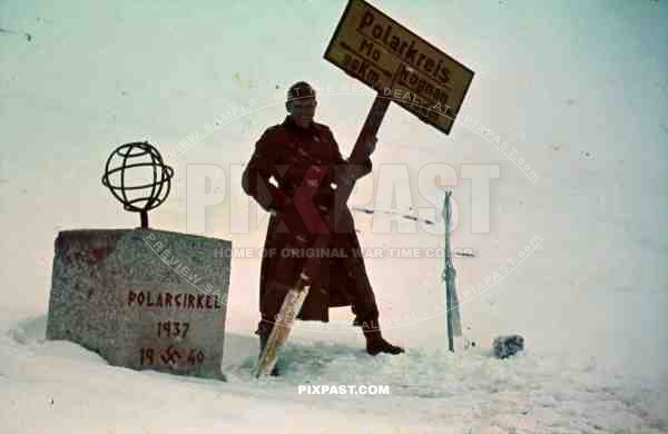 WW2 Color Norway German soldier 1940 with sign post for Polar Circle, Mo, Kognan