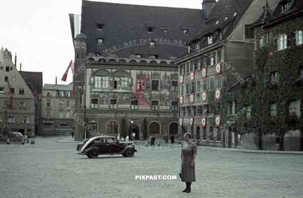 WW2 color old cars market place flags town wiesbaden summer 1939