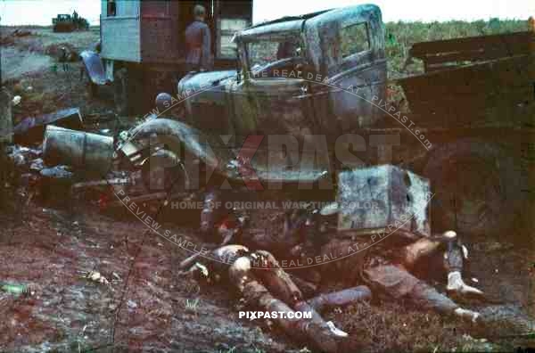 WW2 color Russian front 1942 Dead killed russian soldiers corpses destroyed bombed supply army trucks bodies