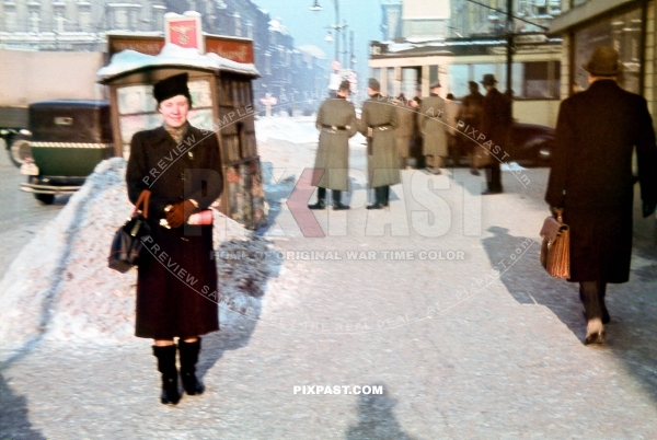 German women in winter jacket. Askanischen Platz. Stresemann Strasse. Schoneberger Berlin winter 1941. Tram. taxi. magazines
