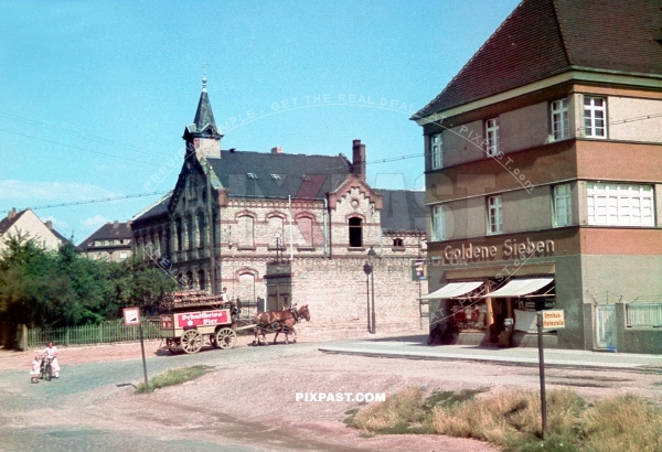 Horse drawn wagon with fresh Schultheiss Bier from Berlin. Halle Saale Germany 1939. Goldene Sieben Shop