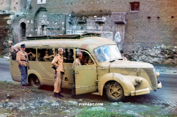 Paratrooper Fallschirmjager board Italian  Alfa Romeo Autobus bus. yellow camouflage. Para Regiment 3. Rome Italy 1943