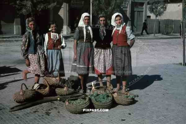 Peasant girls selling grapes on the street in Belgrade, Serbia 1941